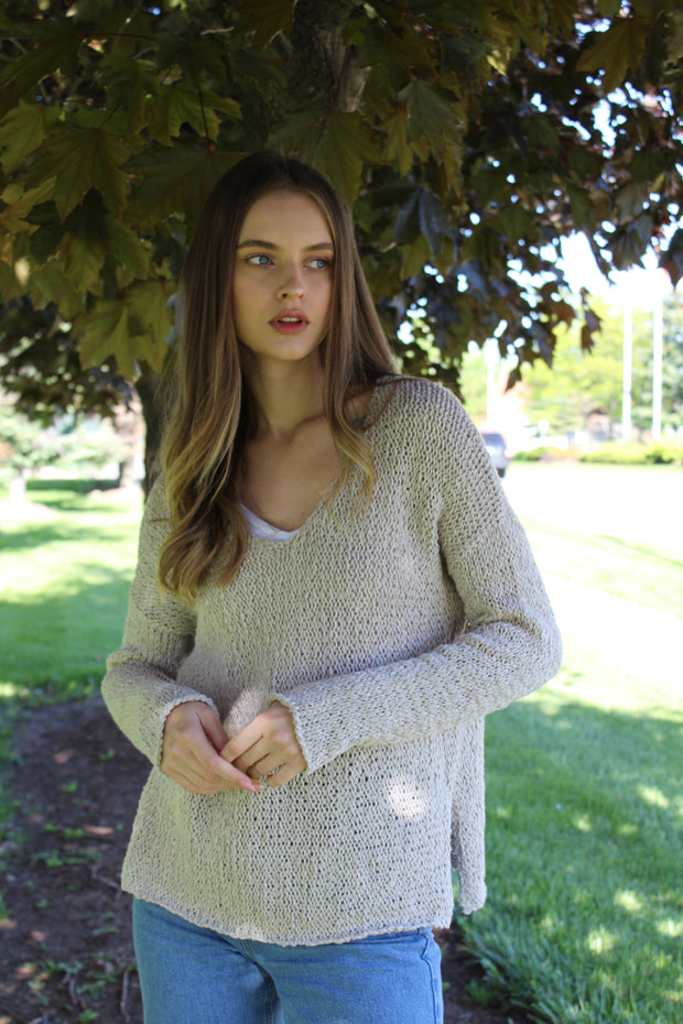 Organic cotton knit sweater.