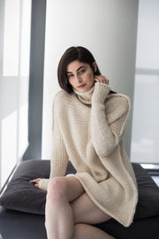 Cream oversized alpaca chunky knit woman sweater .